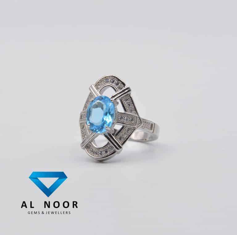 nh sterling silver blue topaz ring